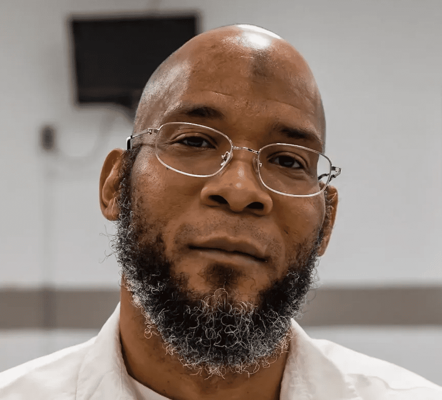 Marcellus Williams, a black man with a beard and glasses.